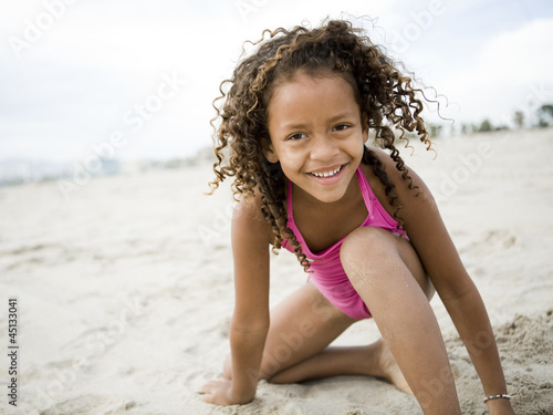 Photo: "USA, California, Los Angeles, Portrait of girl (6-7) on beach" "USA, California, Los Angeles, Portrait of girl (6-7) on beach"