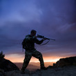 hunter against a sunset