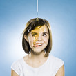 girl with honey pouring on her head