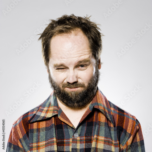 Photo: man in a plaid shirt man in a plaid shirt
