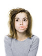 girl with a messy appearance popping a bubble gum bubble
