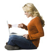 woman buying concert tickets on a laptop