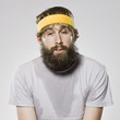 bearded man wearing a headband
