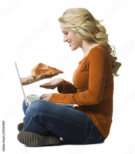 Photo: woman ordering pizza online woman ordering pizza online