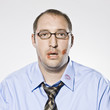 businessman with lipstick kisses on his shirt