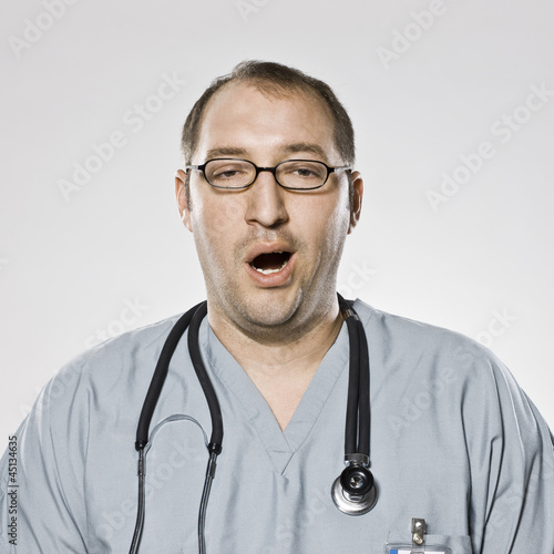 Photo: doctor yawning doctor yawning