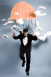 businessman parachuting