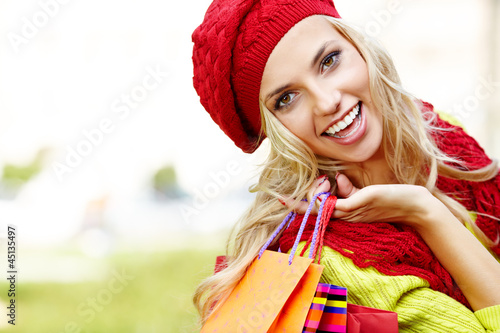 Photo: Shopping woman in autumn colors Shopping woman in autumn colors