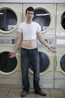 man wearing a shrunken t-shirt