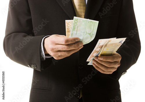 Photo: man counting money man counting money