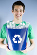 Photo: young man in a recycling t-shirt young man in a recycling t-shirt