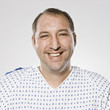 man in a hospital gown