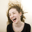 person getting wind blown in the face