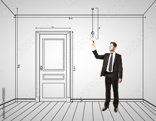 Photo: businessman drawing interior businessman drawing interior