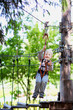 little boy ziplining