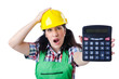 Woman builder with calculator on white