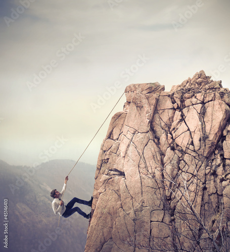 Photo: Businessman Climbing Businessman Climbing