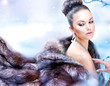 Beautiful Girl in Luxury Fur Coat