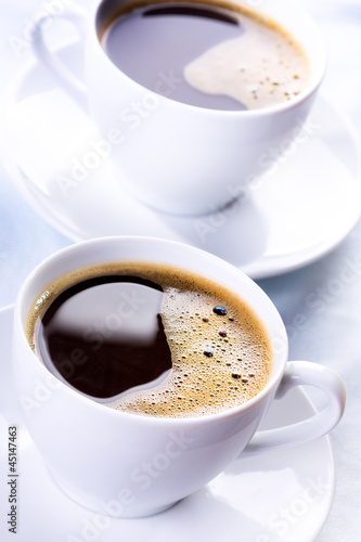 Photo: cups of black coffee cups of black coffee