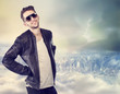 Photo: Young man on top of the city Young man on top of the city