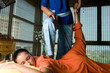 Young woman having thai massage
