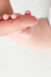 little fingers and mom´s hand