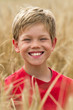 children in a wheat field