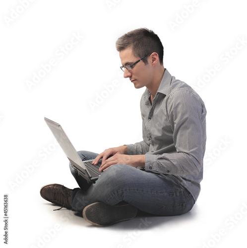 Photo: Young Man on the Computer Young Man on the Computer