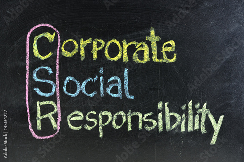 Photo: hand writing corporate social responsibility ( CSR ) hand writing corporate social responsibility ( CSR )