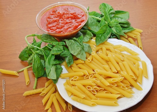 Photo: pasta maccaroni tomato and basil leaf pasta maccaroni tomato and basil leaf