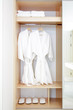 Close up of twins bathrobe in wardrobe