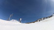 Downhill skier performing a maneuver
