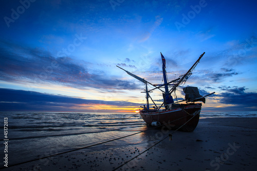 Photo: silhouette of fishermen with sunrise in the background silhouette of fishermen with sunrise in the background