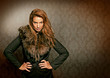 fur 05/luxus lady with fur standing in front of a old wallpaper