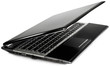 Photo: angle view of a black modern laptop on a white background angle view of a black modern laptop on a white background