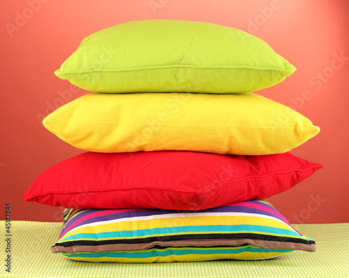 Photo: pillows on red background pillows on red background