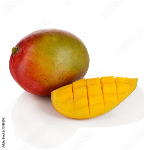 Photo: Ripe appetizing mango isolated on white Ripe appetizing mango isolated on white