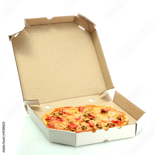 Photo: Tasty pizza in box isolated on white Tasty pizza in box isolated on white
