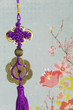 Chinese Hanging Decoration on Lotus Flower Background.
