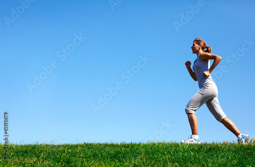 Photo: Jogging woman. Jogging woman.