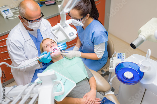 Photo: Dental procedure dentist care female patient Dental procedure dentist care female patient