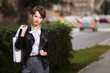 Young woman in leather jacket