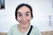 Pretty woman making grimace