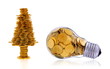 Foto: Business symbols and metaphors, happy tree and golden lightbulb Business symbols and metaphors, happy tree and golden lightbulb