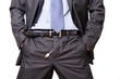 Young businessman pulling out a usb cable out of his pants.
