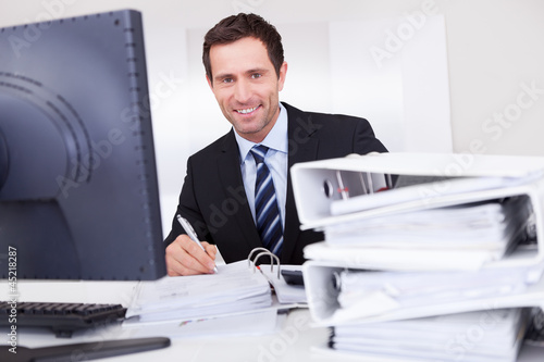 Photo: Portrait Of Happy Businessman Portrait Of Happy Businessman
