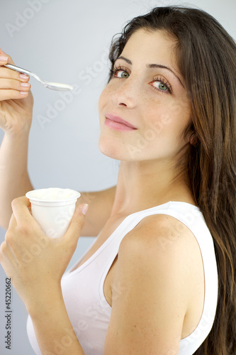Photo: Gorgeous woman ready to eat yogurt Gorgeous woman ready to eat yogurt