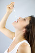 Young beautiful woman on a diet eat yogurt