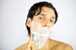 Young handsome man shaving z
