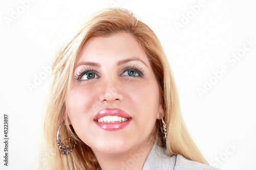 Photo: Pretty woman looking up Pretty woman looking up